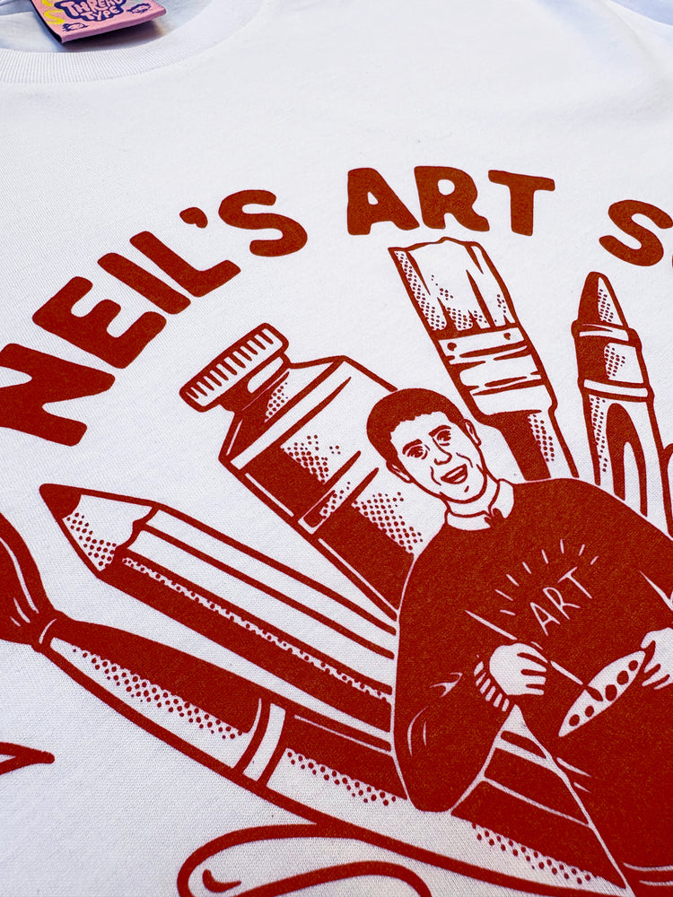 An even closer up shot of 90s TV series Art Attack inspired T-shirt featuring Neil Buchanan with larger than life art materials