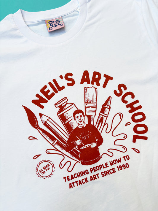 Close up shot of 90s TV series Art Attack inspired T-shirt featuring Neil Buchanan with larger than life art materials