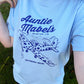 Model wearing our 90s TV show Come Outside inspired T-shirt design - featuring Pippin in a polka dot plane