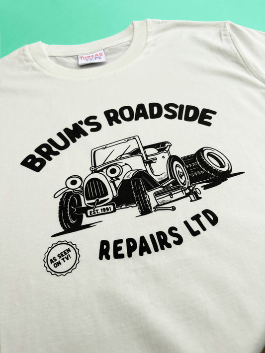 90s TV Show Brum inspired T-shirt design featuring a car with eye in a car workshop